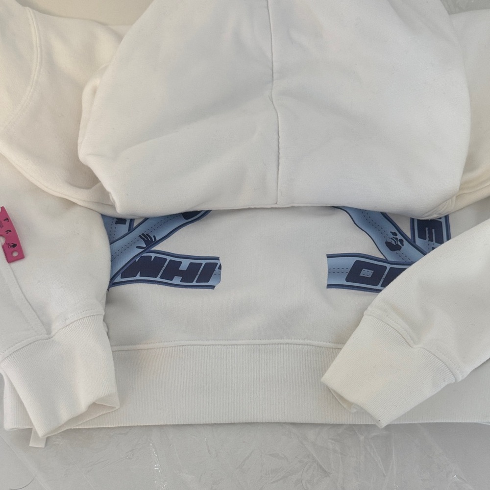 Off-White White Pullover Hoodie with Blue Logo “OFF WHITE” arrow tape back.